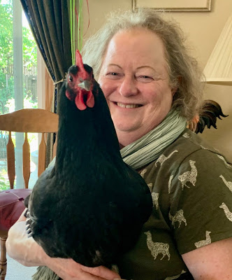 Cathy holding a black chicken